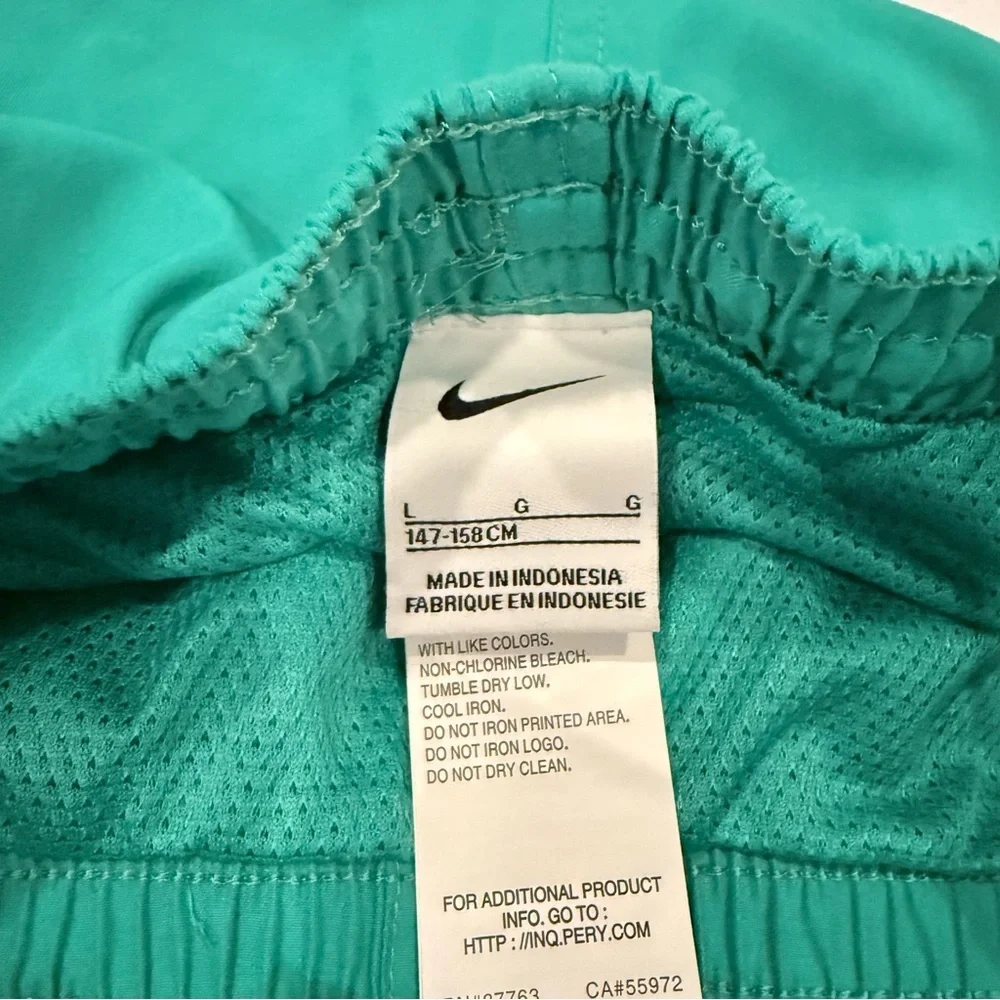 NWT Nike boys size large green swim trunks